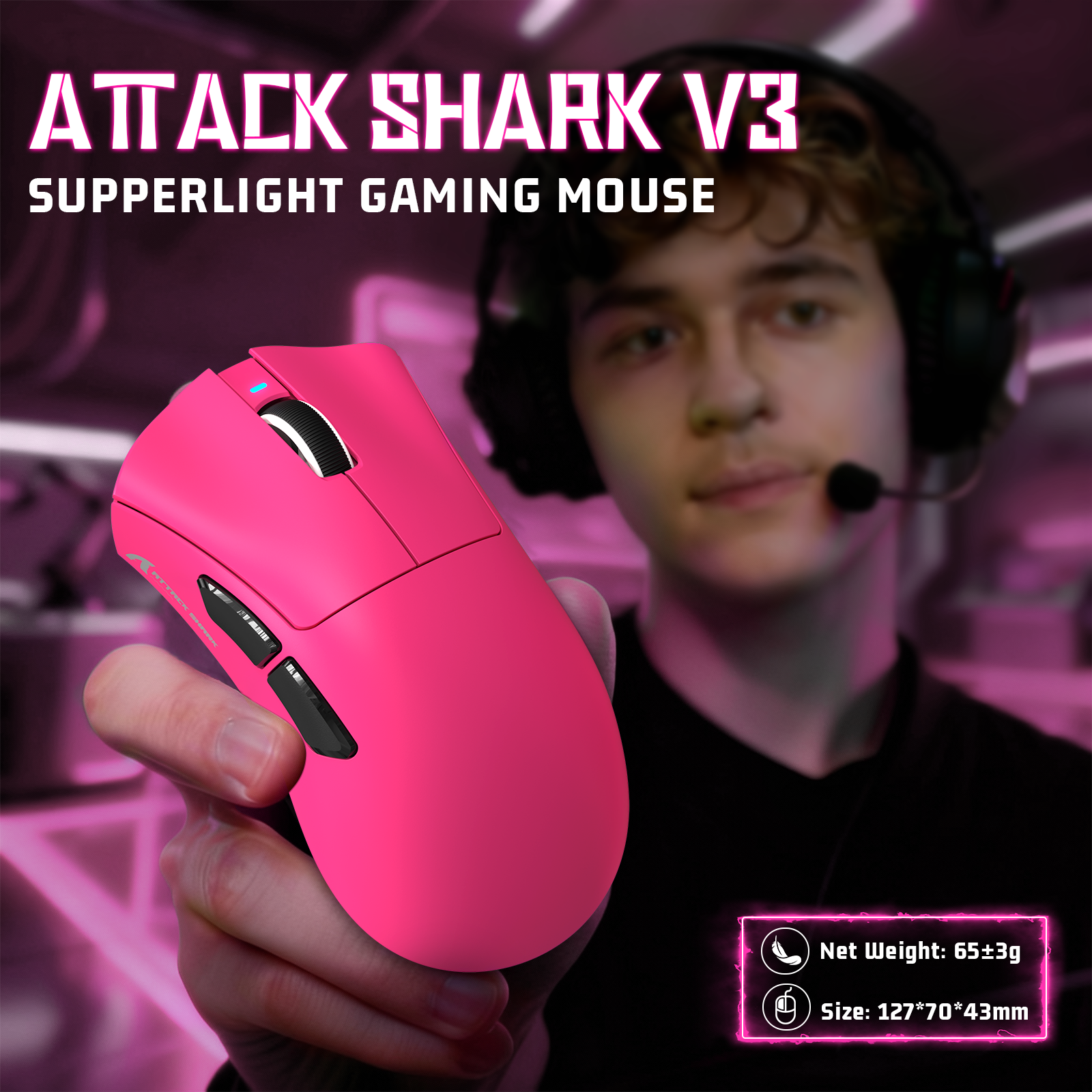 Pink ATTACK SHARK V3 ultra-light gaming mouse held by a person with gaming headset