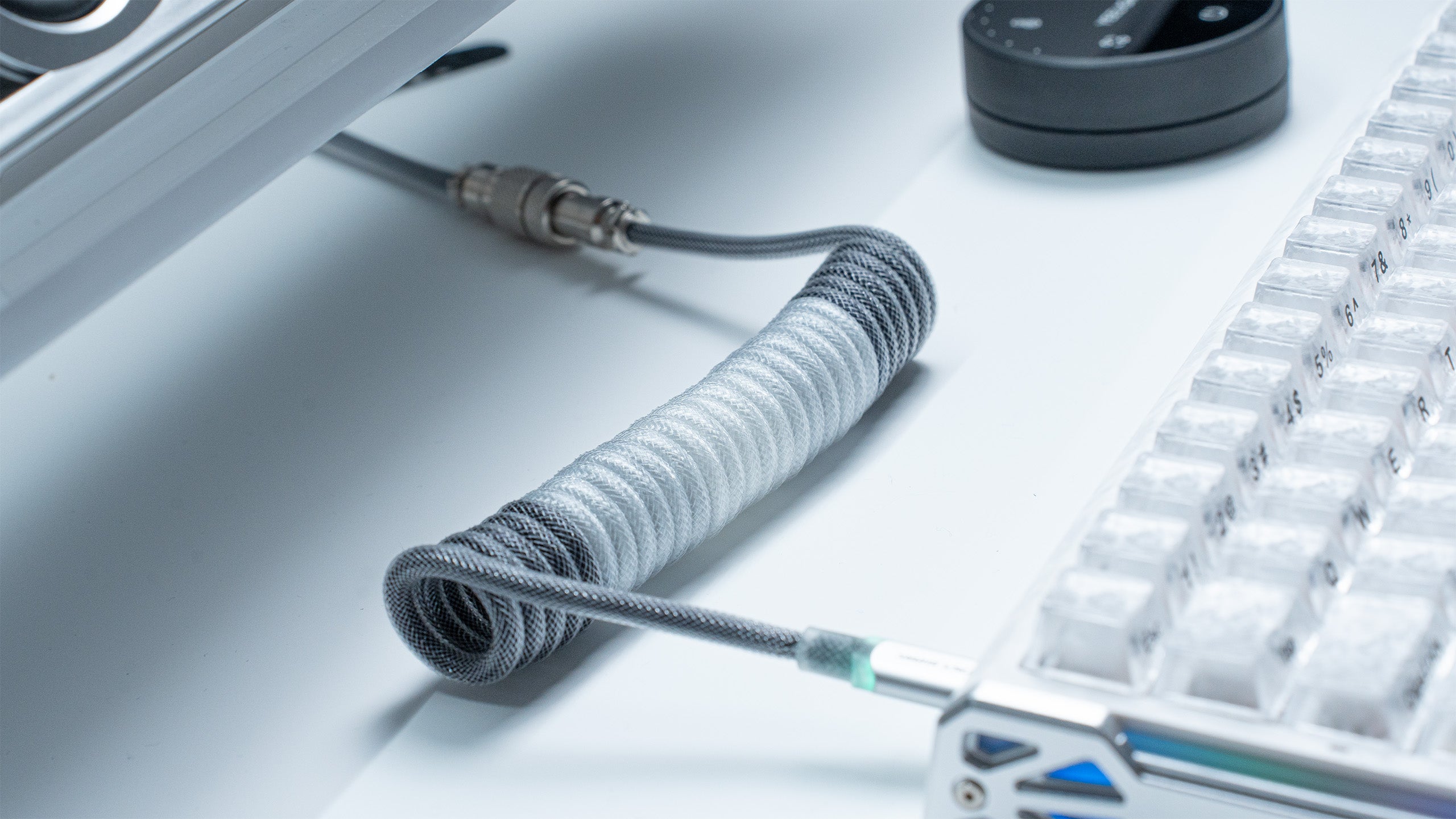 Gray coiled USB-C keyboard cable with metal aviator connector for 8K magnetic keyboards